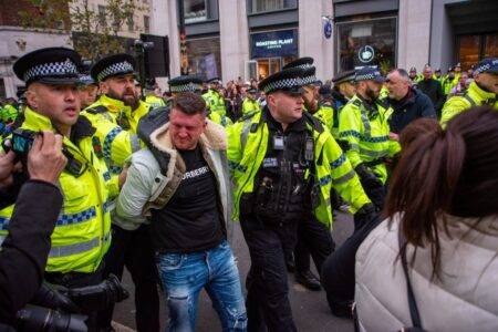 Tommy Robinson pepper sprayed during arrest at march against antisemitism