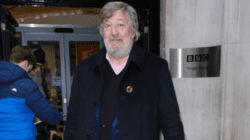 Stephen Fry puts on brave face after breaking leg and pelvis ‘in many places’