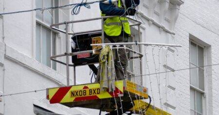 Man fighting for life after being hit by van as he was putting up Christmas lights