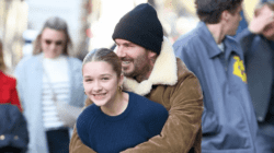 Doting dad David Beckham pulls Harper, 12, into giant bear hug in playful New York outing