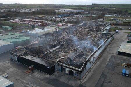 Man arrested for arson after massive fire demolishes Bridgend Industrial Estate