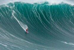 Daredevil surfers risk their lives in pictures that will set your teeth on edge