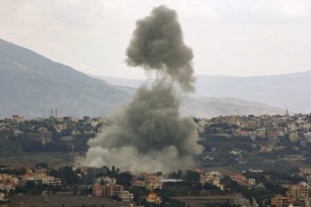 Israel strikes dozens more sites in southern Lebanon as thousands flee homes