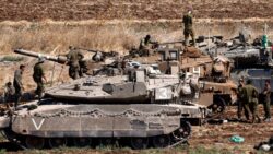 Israeli tanks mass on Lebanon border as ground invasion looms