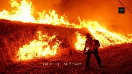 Firefighters battle massive wildfire north of LA as winds intensify