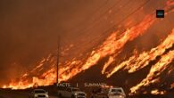 Thousands evacuated as fast-moving wildfire breaks out near Los Angeles